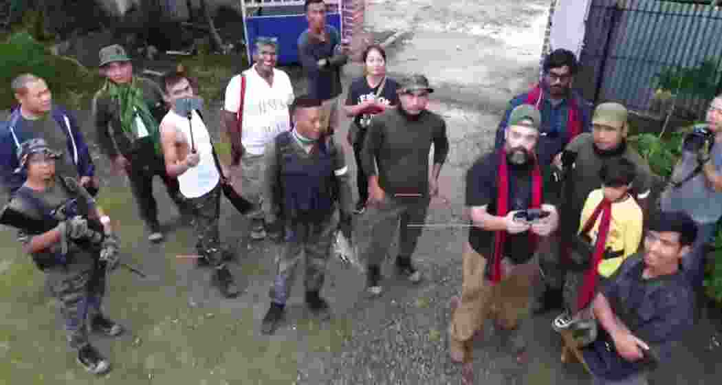 US preacher Daniel Courney instructs suspected Kuki militants on using a drone in a village in Manipur.