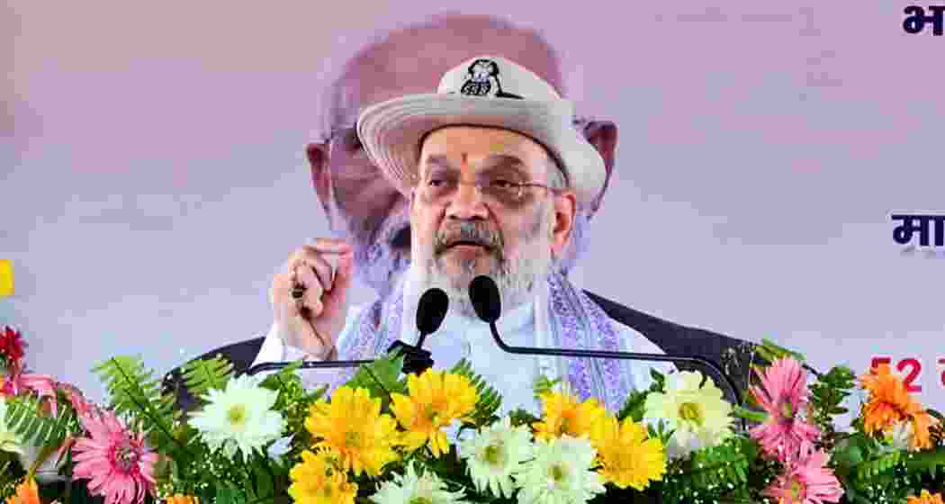 Union Home Minister Amit Shah addresses a gathering during the inauguration of Border Out Posts 'Leti' and 'Indarwa' and e-unveiling and e-foundation laying of various works of the Sashastra Seema Bal (SSB), in Araria, Bihar. (@AmitShah/X via PTI Photo)