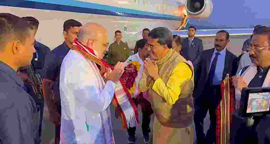 Union Home Minister Amit Shah receives a warm welcome at Agartala's MBB Airport, greeted by Chief Minister Manik Saha and other key leaders and officials as he arrives for the 72nd NEC Plenary Session at Agartala on Friday.
