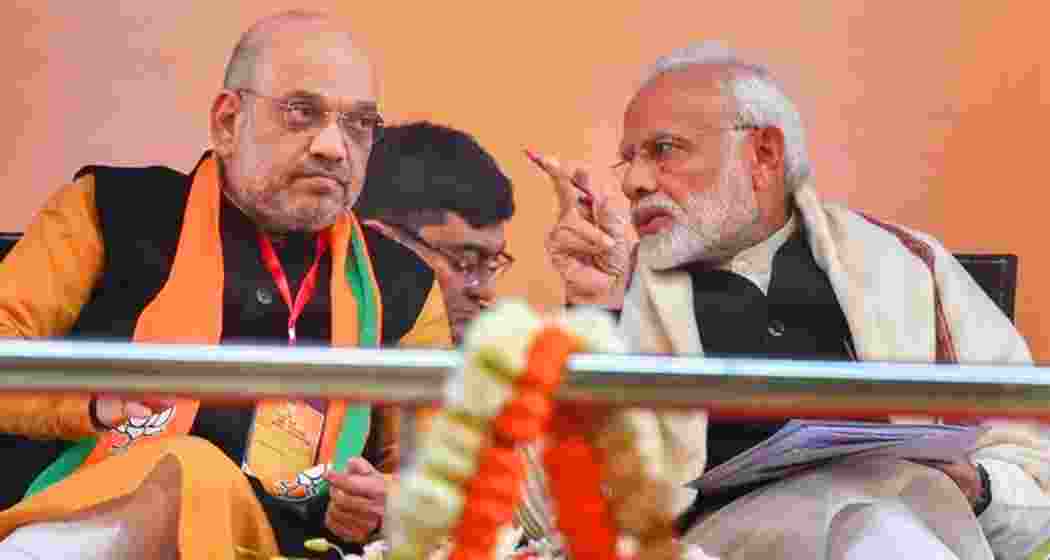 Amit Shah with Narendra Modi. (File photo)