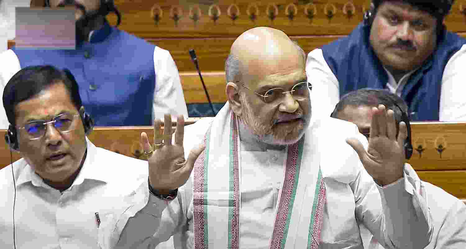 Union Home Minister Amit Shah speaks during a debate in the Lok Sabha on the Pahalgam terror attack and Operation Sindoor, at the Monsoon session of Parliament, in New Delhi, Monday.