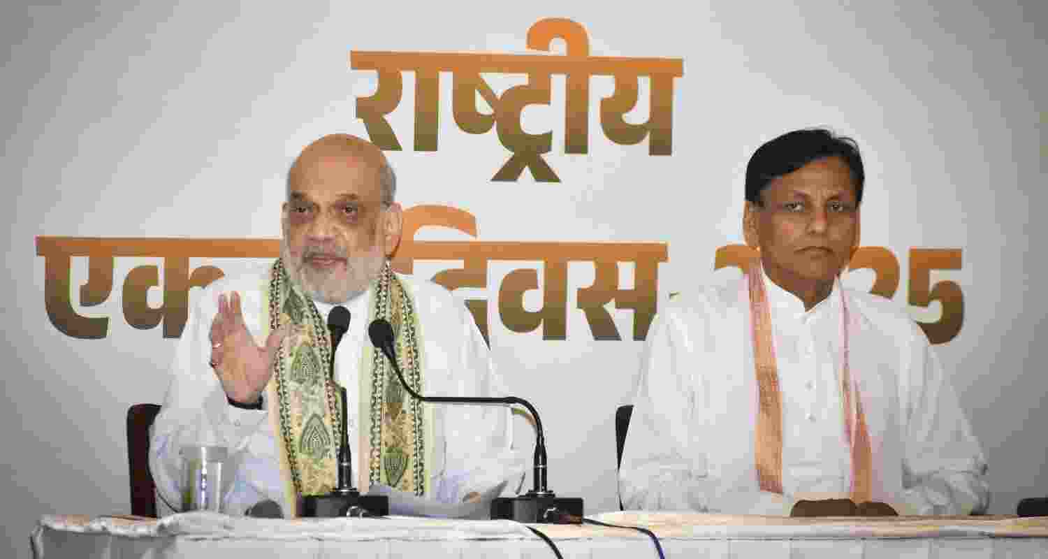 Union Home Minister Amit Shah addresses a press conference as MoS Nityanand Rai looks on, in Patna, Thursday.