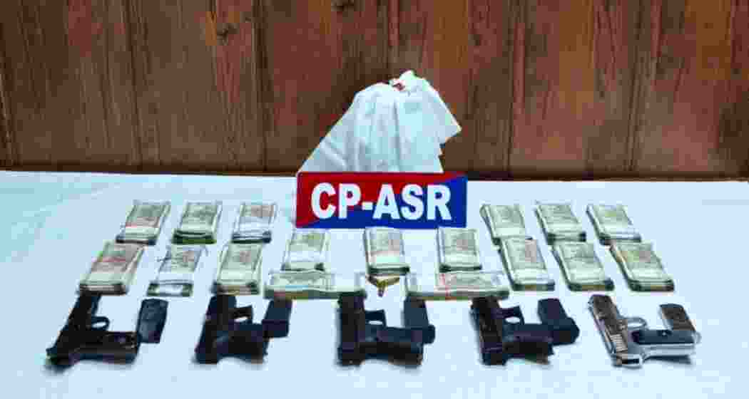 Weapons and hawala cash seized by Amritsar Police during a crackdown on an arms-narcotics module operated by Pakistani and Malaysian handlers.
