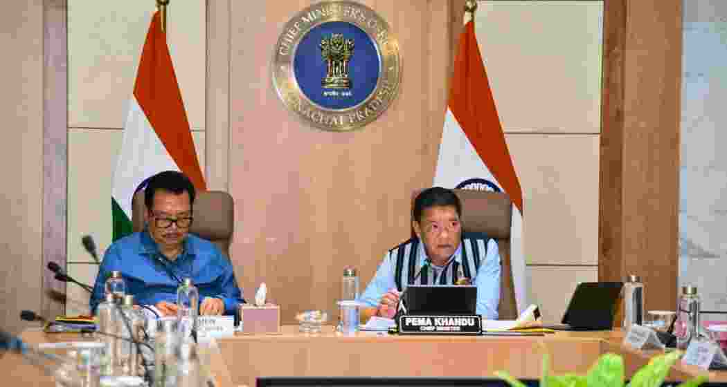 Chief Minister Pema Khandu addresses a meeting of the Arunachal Pradesh Cabinet in Itanagar on Thursday. Deputy Chief Minister Chowna Mein (L) could also be seen.