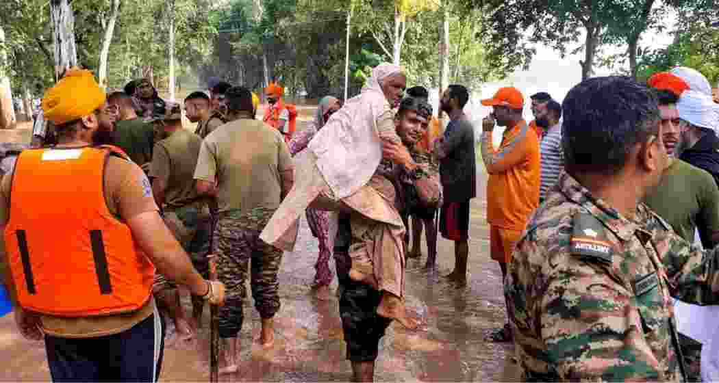 The Army carrying out a rescue and relief operation in a flood-ravaged village near Ajnala in Amritsar district on Thursday.