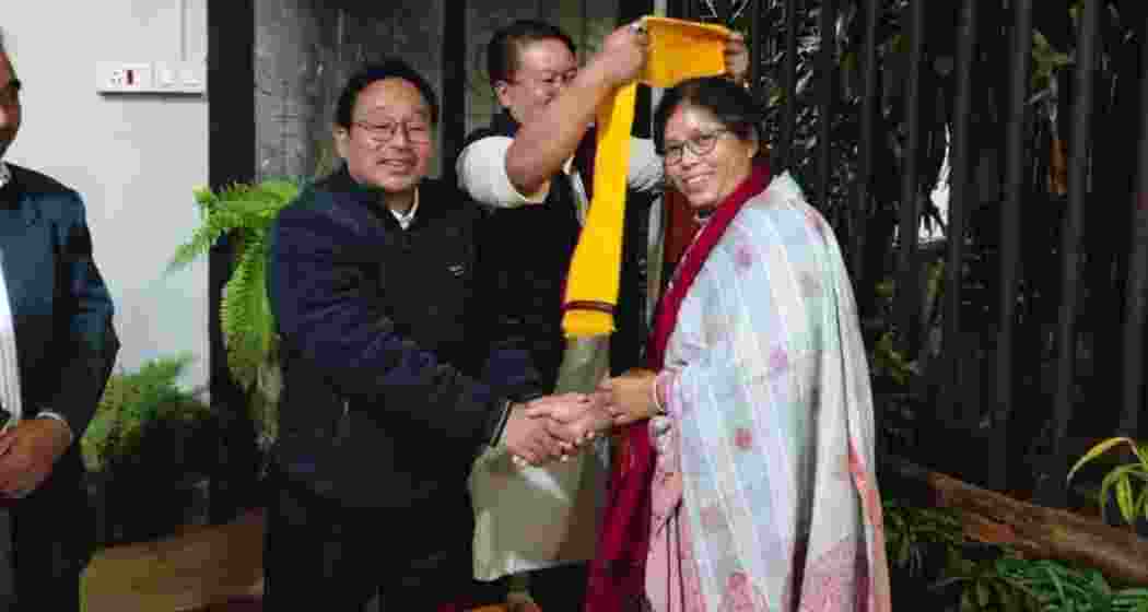 Nandita Garlosa joins Congress at Haflong, alongside state secretary Nirmal Langthasa and other leaders, ahead of Assam assembly elections scheduled for April 9.