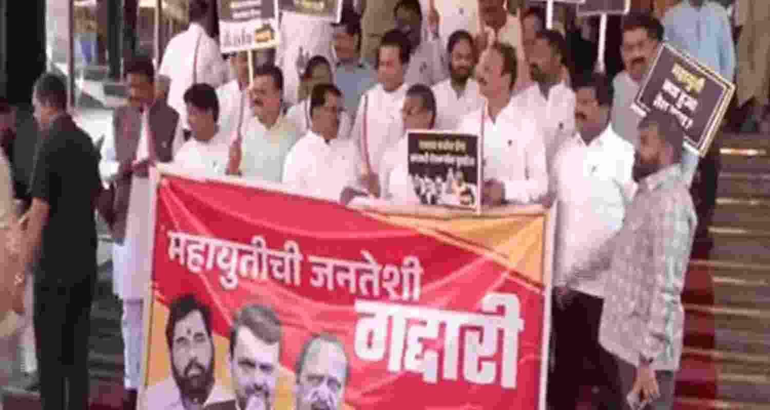 Opposition MLAs protest outside Maharashtra Assembly