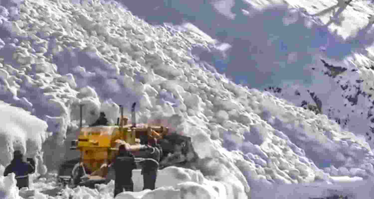 In this screengrab from a video received on March 27, 2026, A snow-cutter blower clears snow following multiple avalanches that hit the Srinagar-Leh national highway near Zojila Pass, in Jammu and Kashmir. Seven people were killed.
