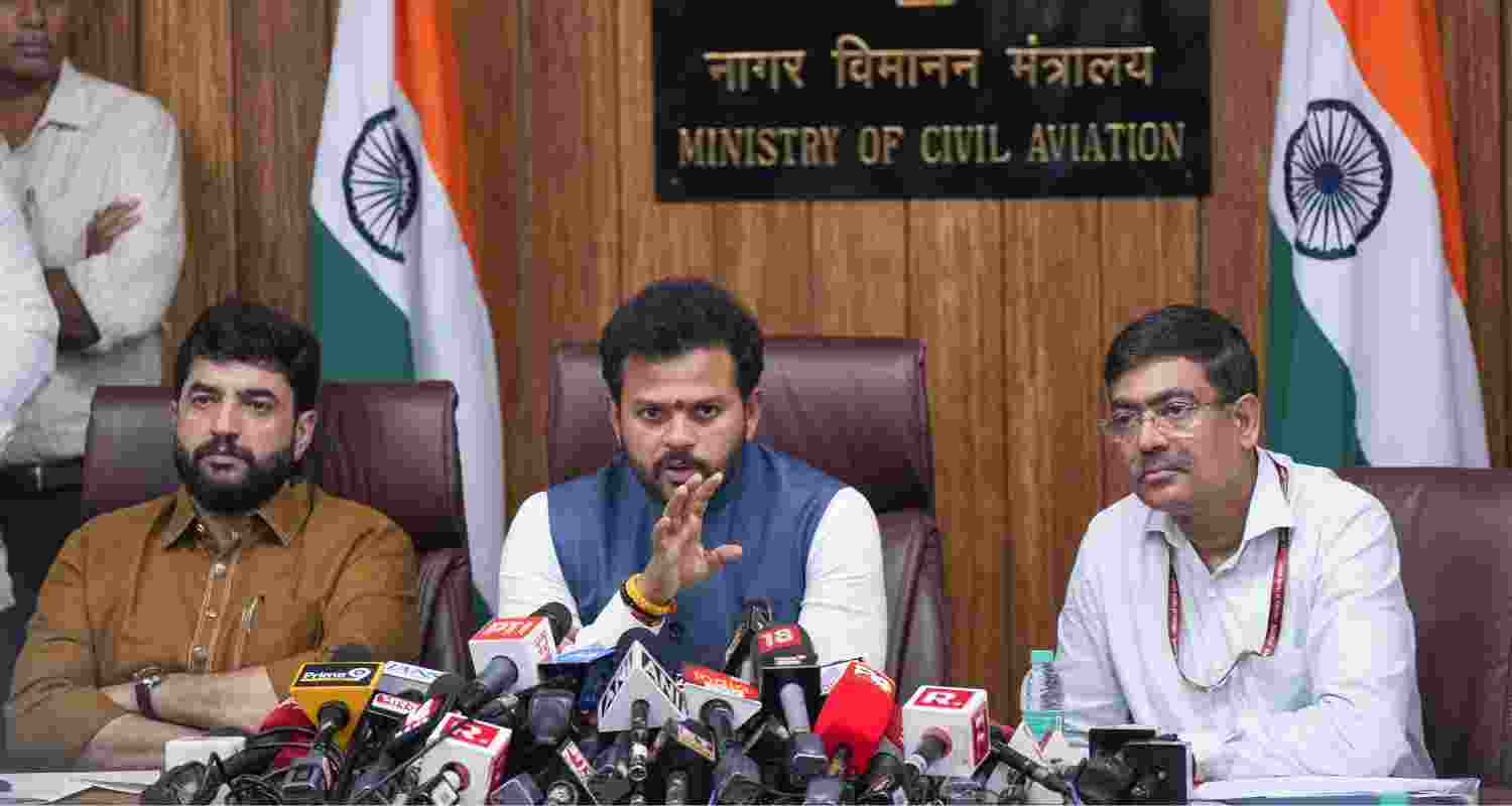 Civil Aviation Minister Rammohan Naidu with Minister of State for Civil Aviation Murlidhar Mohol and Ministry of Civil Aviation Secretary Samir Kumar Sinha addresses a press conference, in New Delhi, Saturday.