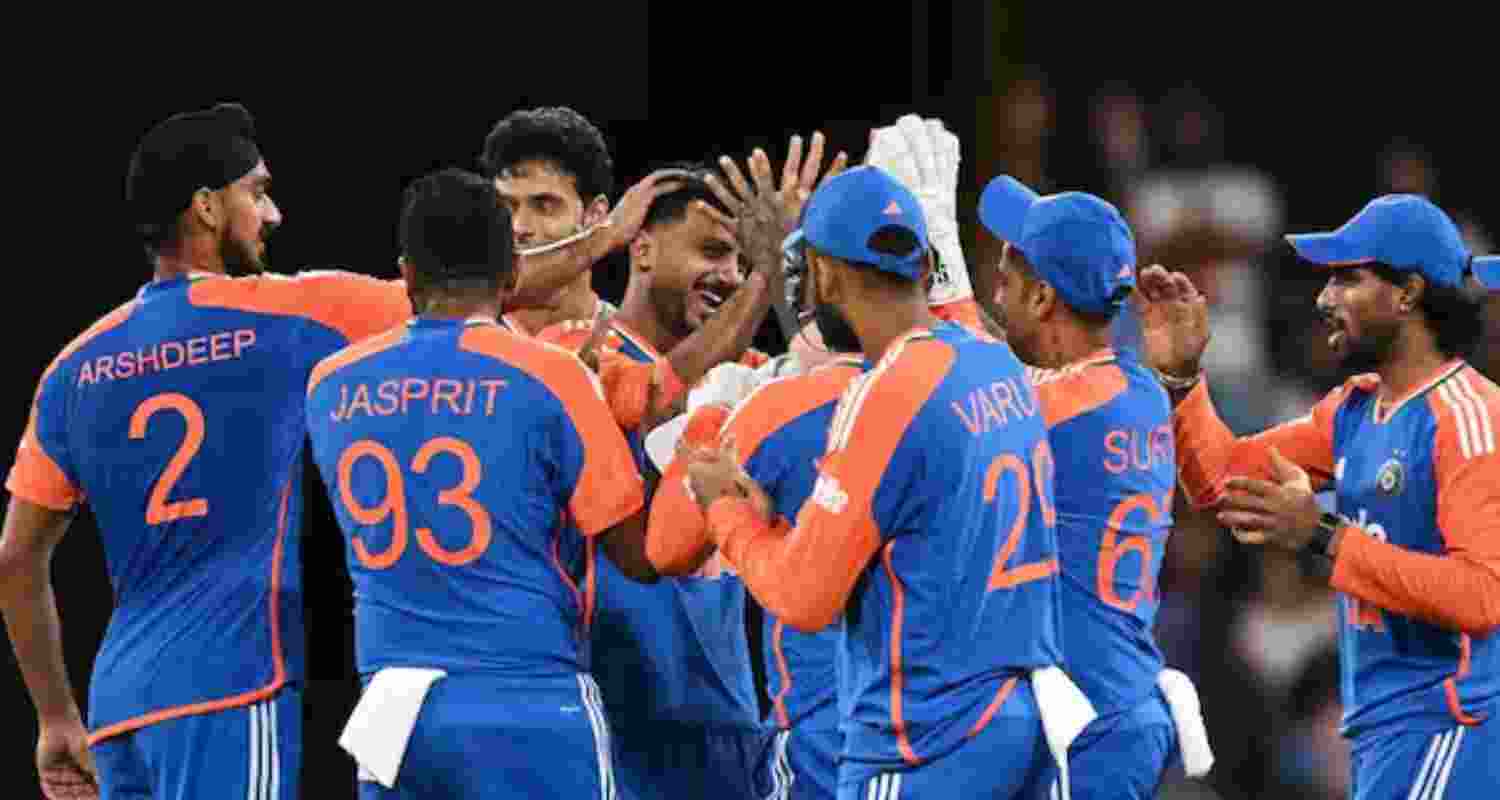 Axar Patel celebrates with teammates after getting rid of Australian opener Matthew Short.