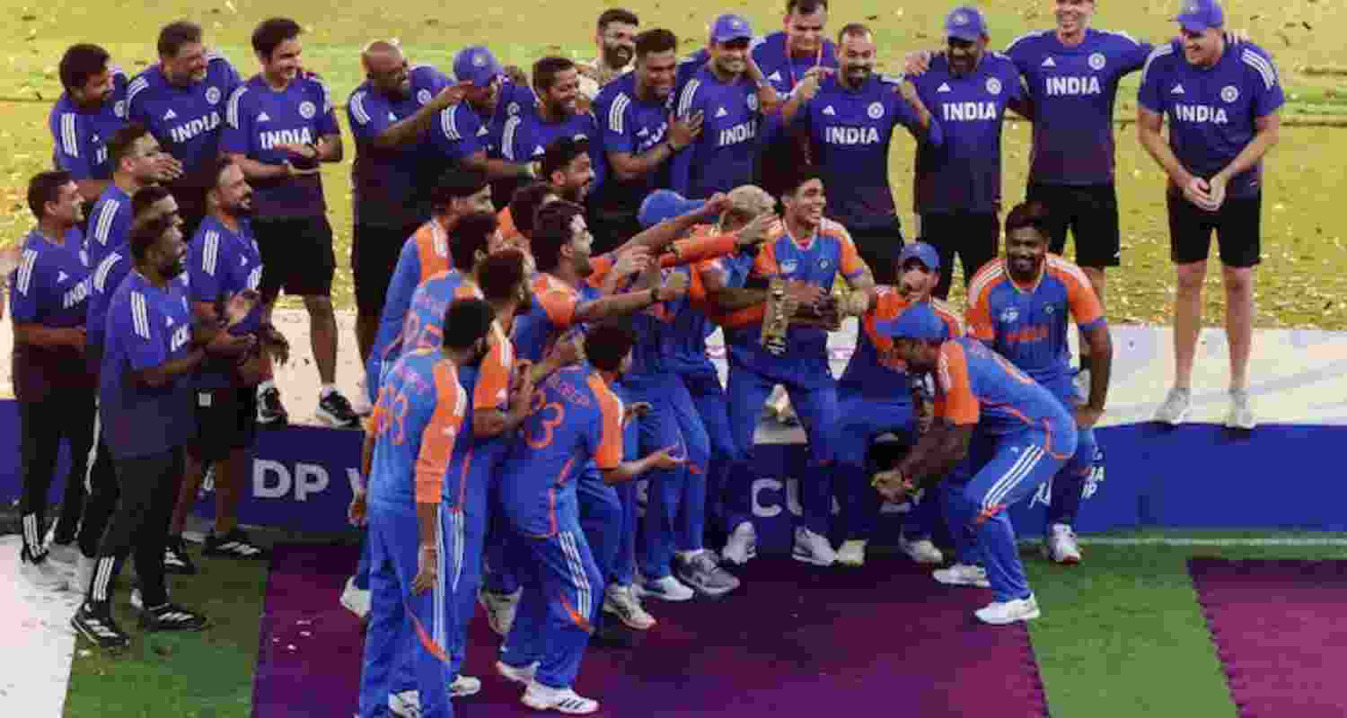 The Indian team celebrating their victory with a mock trophy once the dignitaries left after the post-match presentation in Dubai on Sunday. The Indian team celebrating their victory with a mock trophy once the dignitaries left after the post-match presentation in Dubai on Sunday.