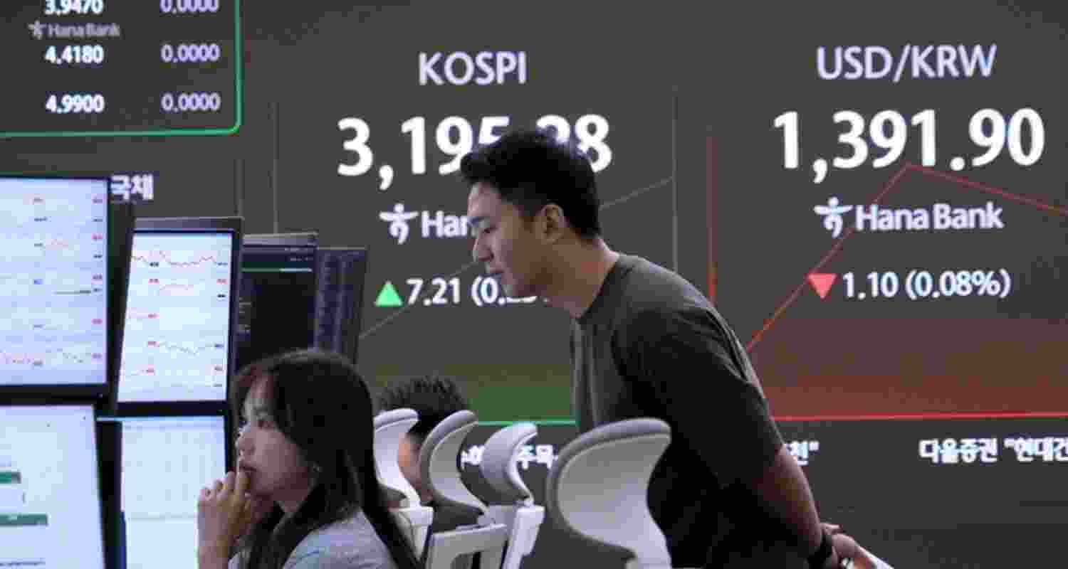 Asian shares were mixed on Monday, while US stock futures rose modestly following Wall Street’s third consecutive weekly gain.