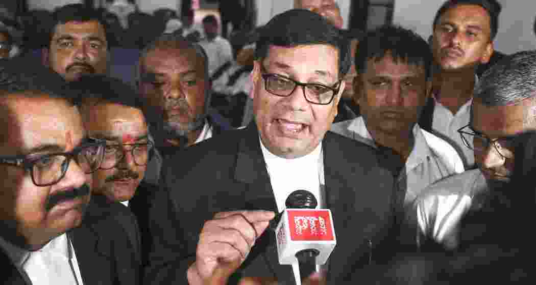 Faizabad Bar Association president Kalika Prasad Mishra addresses the media at the Faizabad District Court, in Ayodhya, Uttar Pradesh, on Monday.