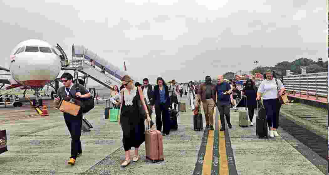 Foreign delegates arrive at Bagdogra International Airport to observe the Assembly elections under the International Election Visitors’ Programme (IEVP) 2026.