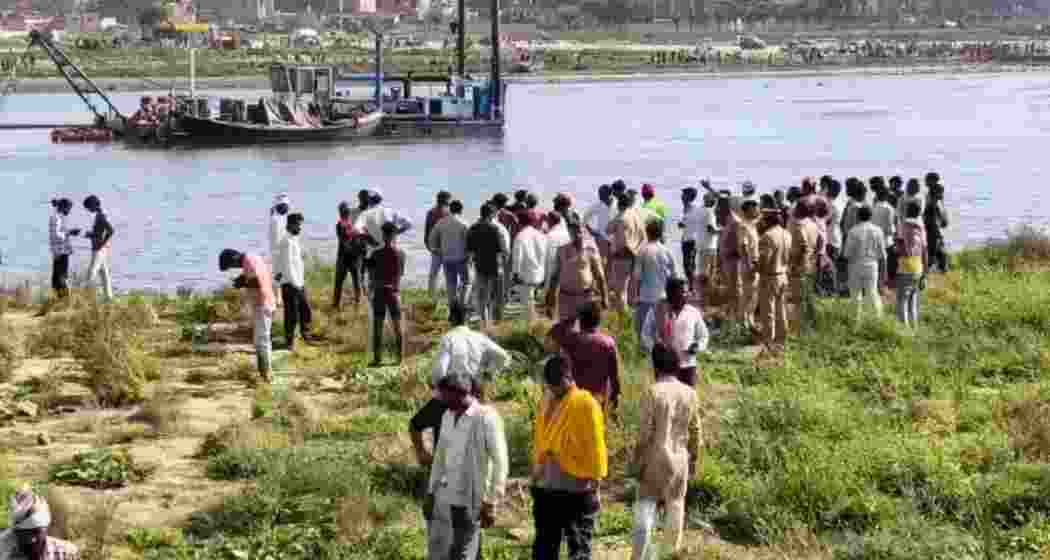 Rescue teams conduct search operations in the Yamuna River at Keshi Ghat in Vrindavan after a tourist boat carrying visitors from Punjab capsized, leaving at least ten dead and several missing.