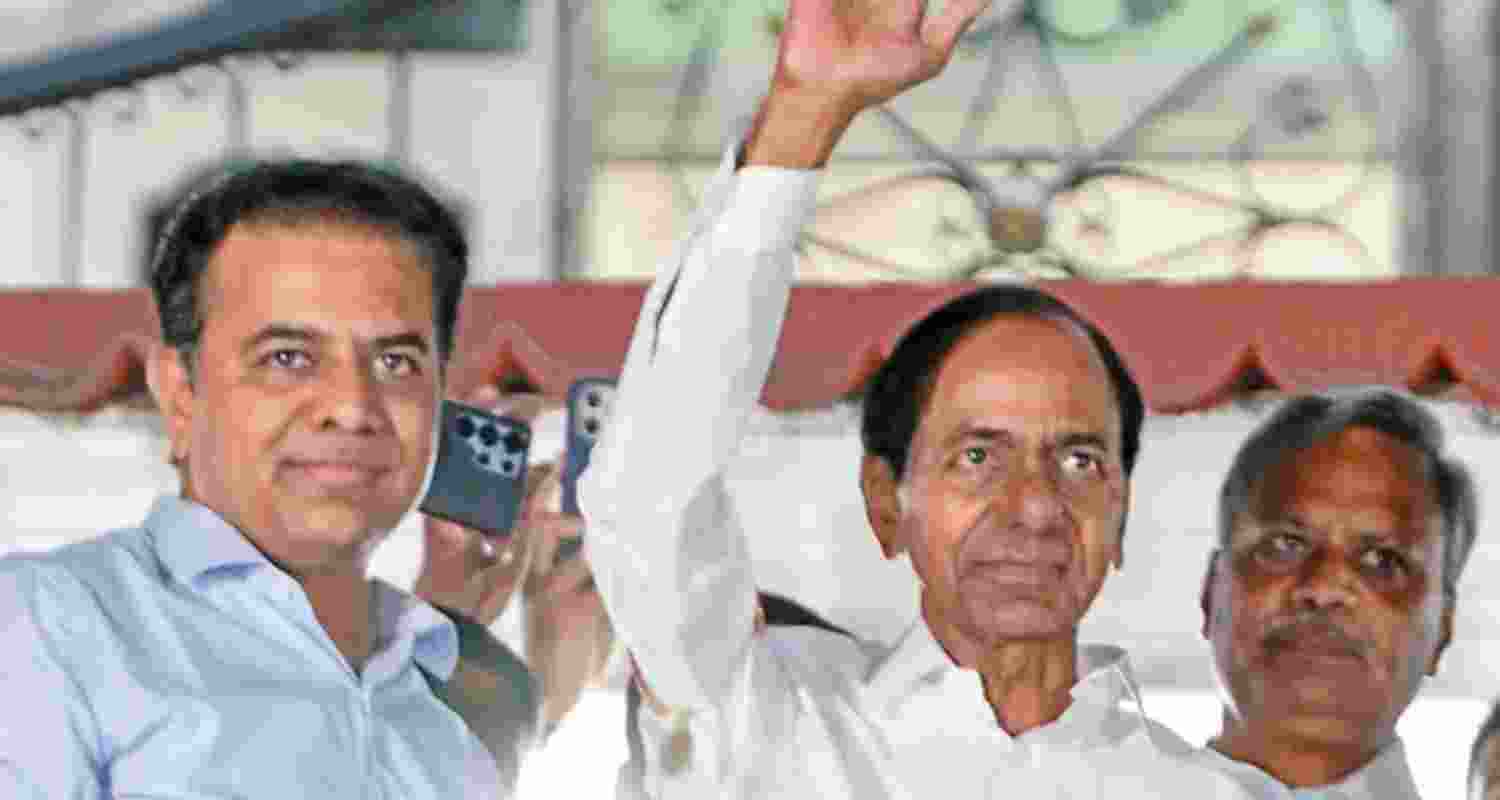 Bharat Rashtra Samithi (BRS) working president KT Rama Rao with the party supremo K Chandrashekar Rao - file image.