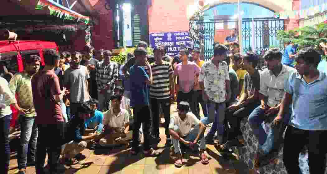Students of Calcutta University’s Carmichael Hostel protest after being attacked by hawkers.