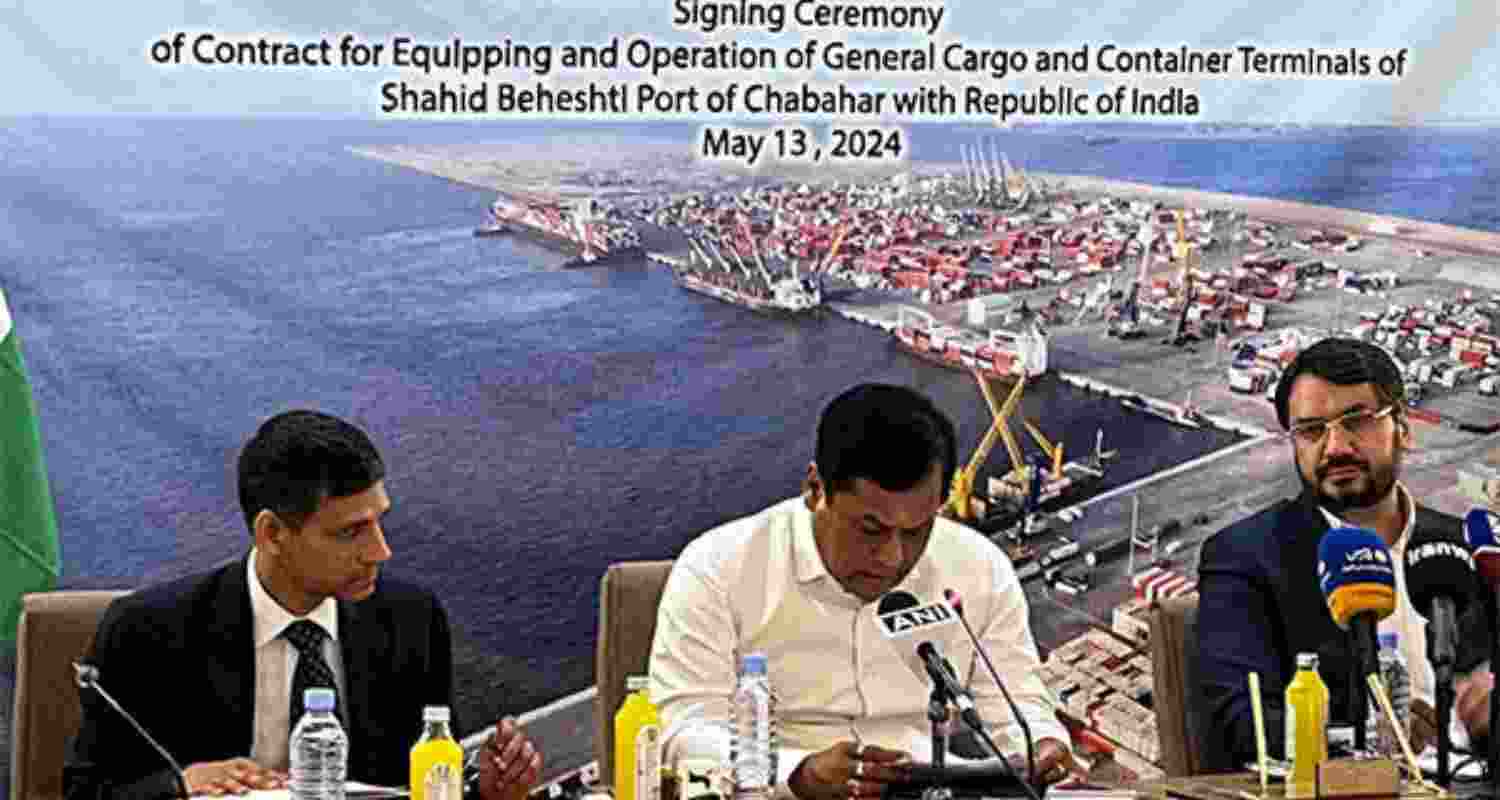 Union Minister of Ports, Shipping and Waterways Sarbananda Sonowa with Iran's Minister for Roads and Urban Development Mehrdad Bazrpash.