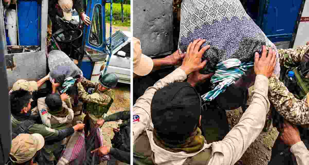Security personnel bring down the body of the truck driver who was shot dead during a militant ambush on a security-escorted convoy in Manipur’s Ukhrul district on Friday.