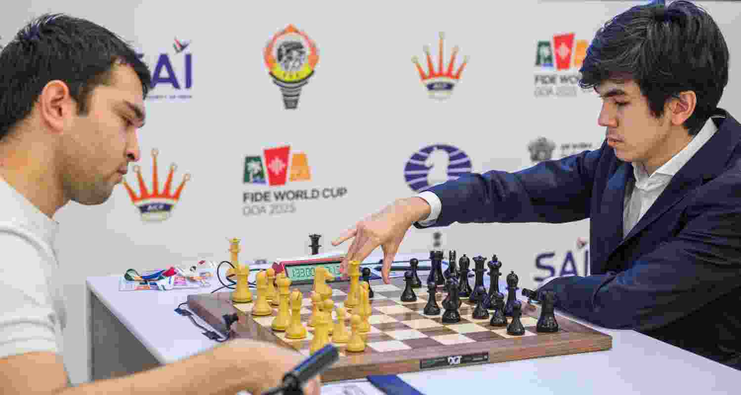 Yakubboev Nodirbek and Javokhir Sindarov of Uzbekistan in action during the semifinals of the FIDE World Cup in Panaji on Friday.