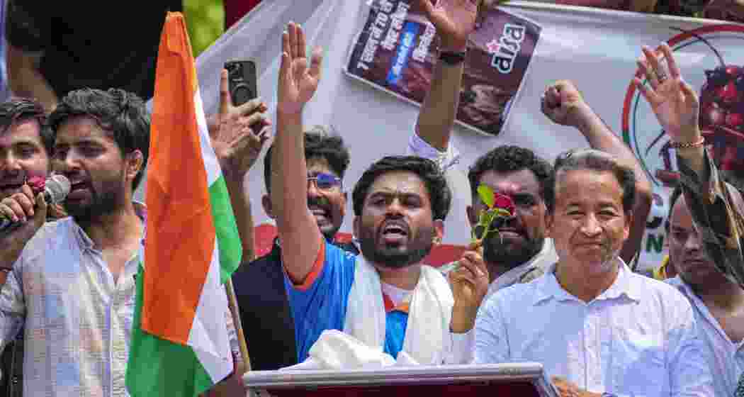 Cockroach Janta Party (CJP) founder Abhijeet Dipke, centre, Climate activist Sonam Wangchuk, front right, and others during a protest demanding the resignation of Union Education Minister Dharmendra Pradhan over alleged examination-related lapses, at the Jantar Mantar, in New Delhi, on Saturday, June 6, 2026. (PTI Photo/Karma Bhutia)