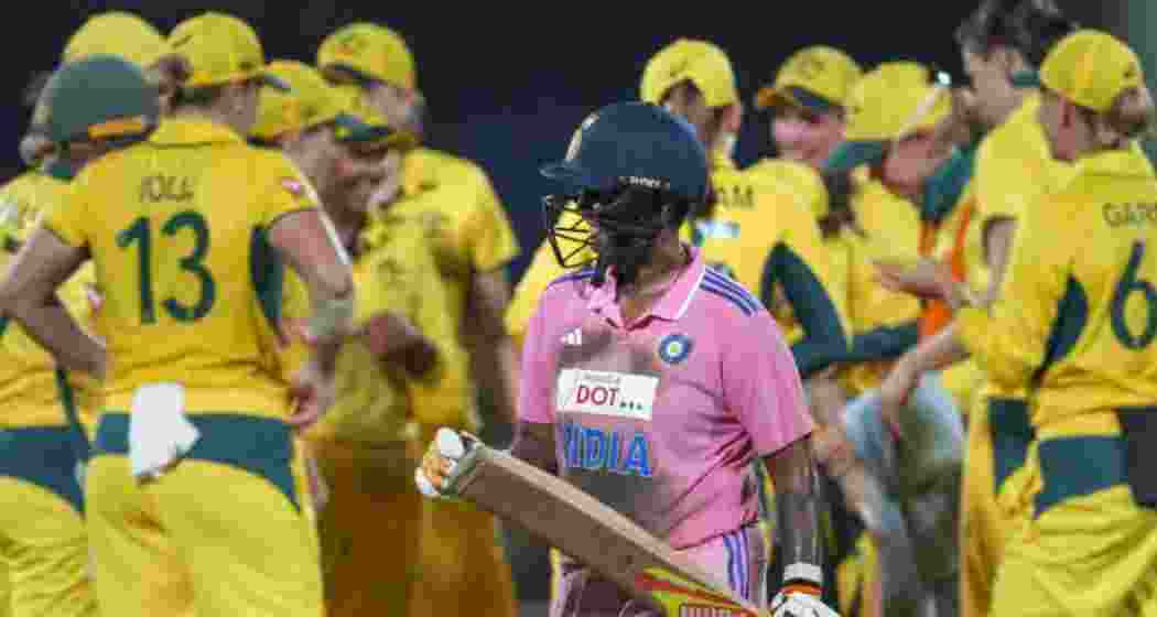 Australian players celebrate as India falls short in WODI series.