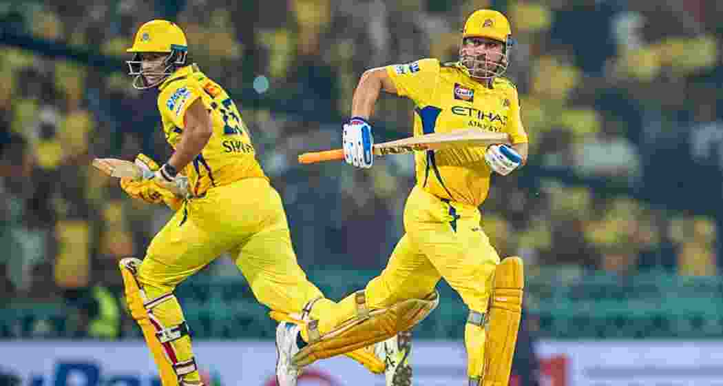 MS Dhoni and Shivam Dube steal a run during CSK's match against LSG at Lucknow on Monday.