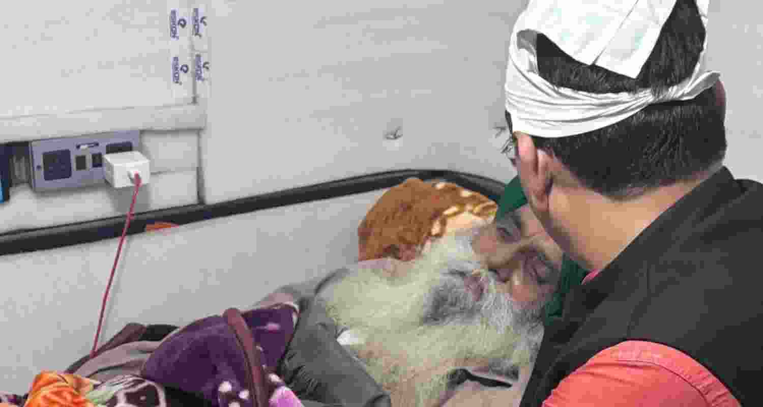 Punjab AAP leader Aman Arora with farmer leader Jagjit Singh Dallewal. 