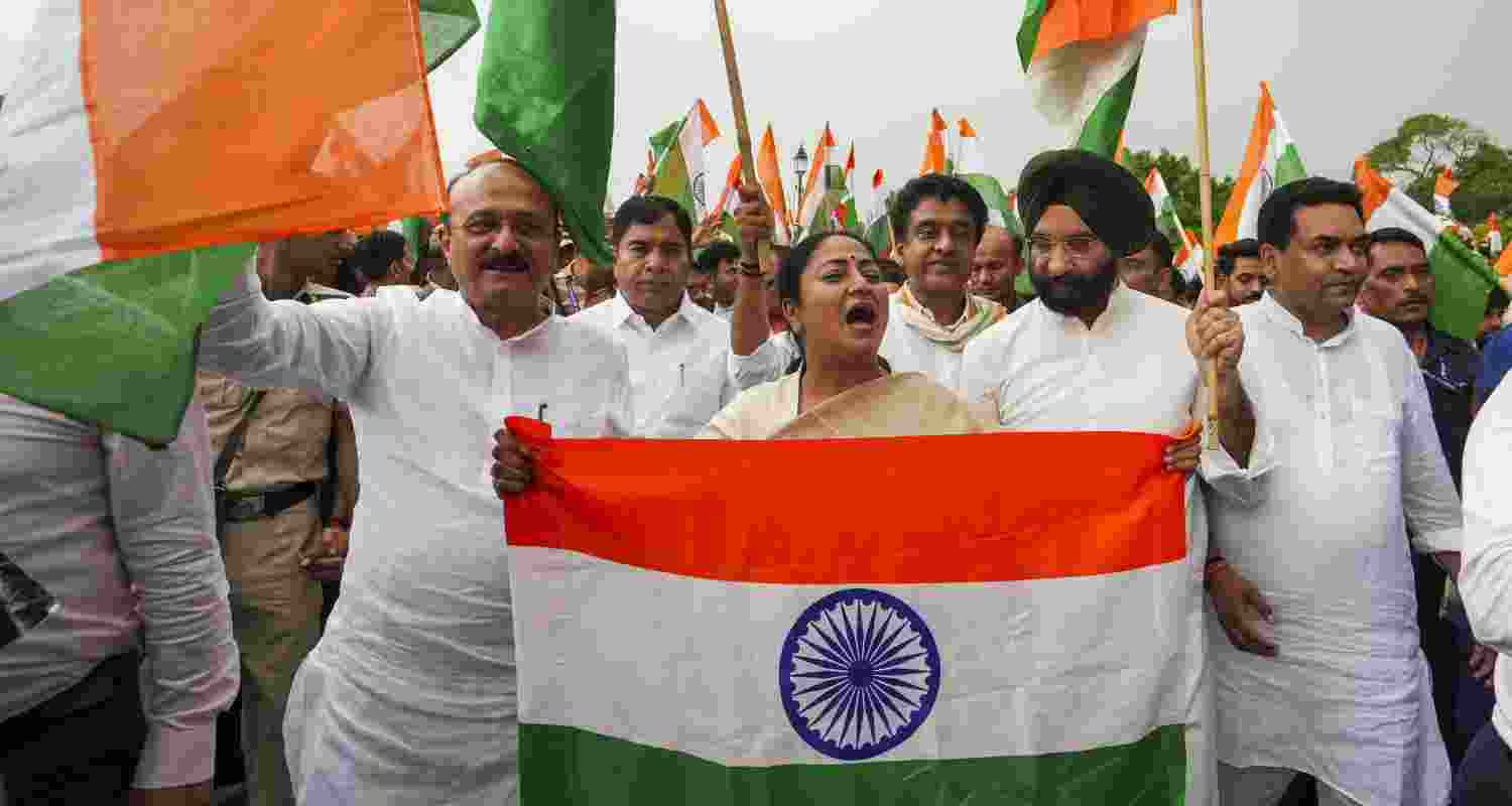 Delhi Chief Minister Rekha Gupta with ministers Ashish Sood, Manjinder Singh Sirsa, and Kapil Mishra takes part in the 'Tiranga Yatra' from Kartavya Path to the National War Memorial to express solidarity with the Indian armed forces, in New Delhi, Tuesday.