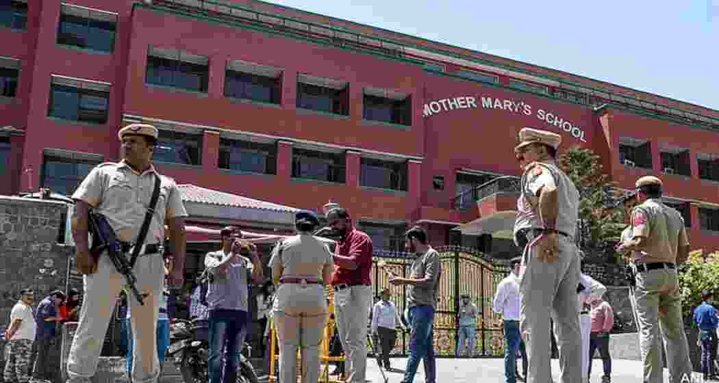 A Delhi school under heightened security after bomb threat emails. Police have apprehended a student, uncovering a group allegedly responsible for multiple hoaxes.