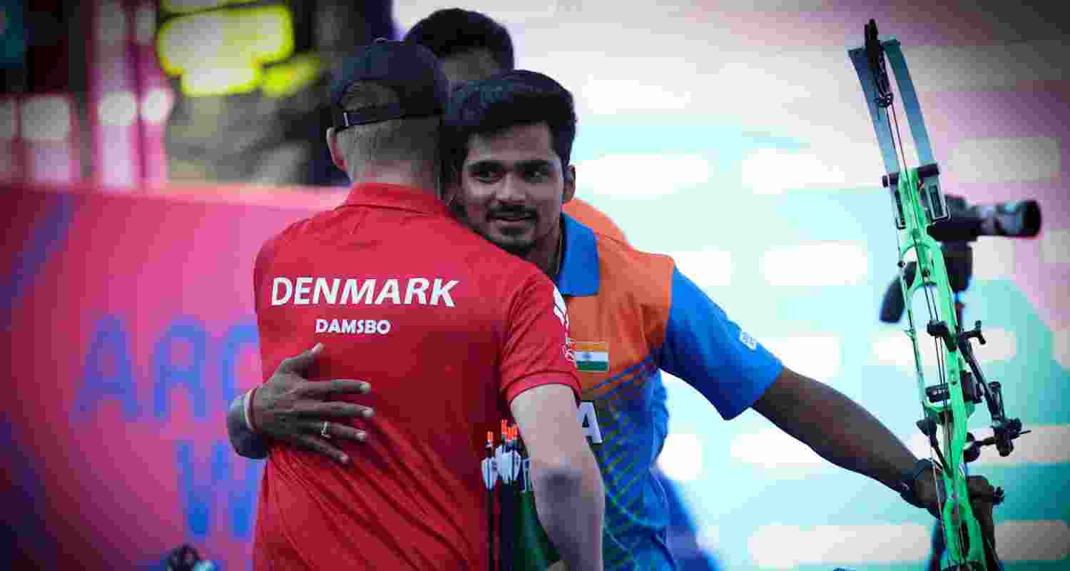 Reigning World University Games champion Sahil Jadhav being congratulated by his Denmark adversary Martin Damsbo.