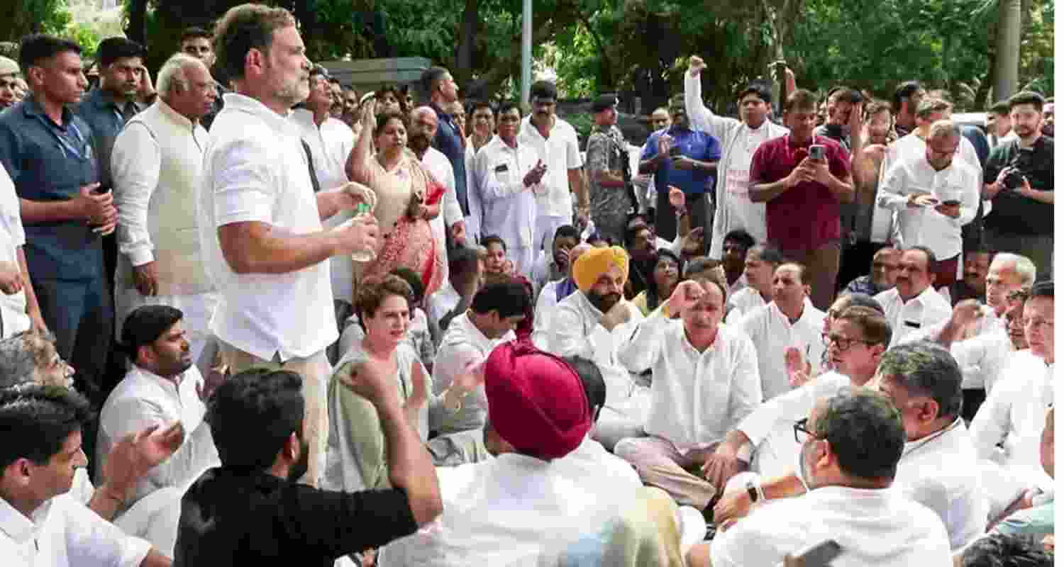 Congress leader Rahul Gandhi, party president Malikarjun Kharge and Congress MP Priyanka Gandhi staging a sit-in outside the PM's residence in New Delhi on Tuesday.