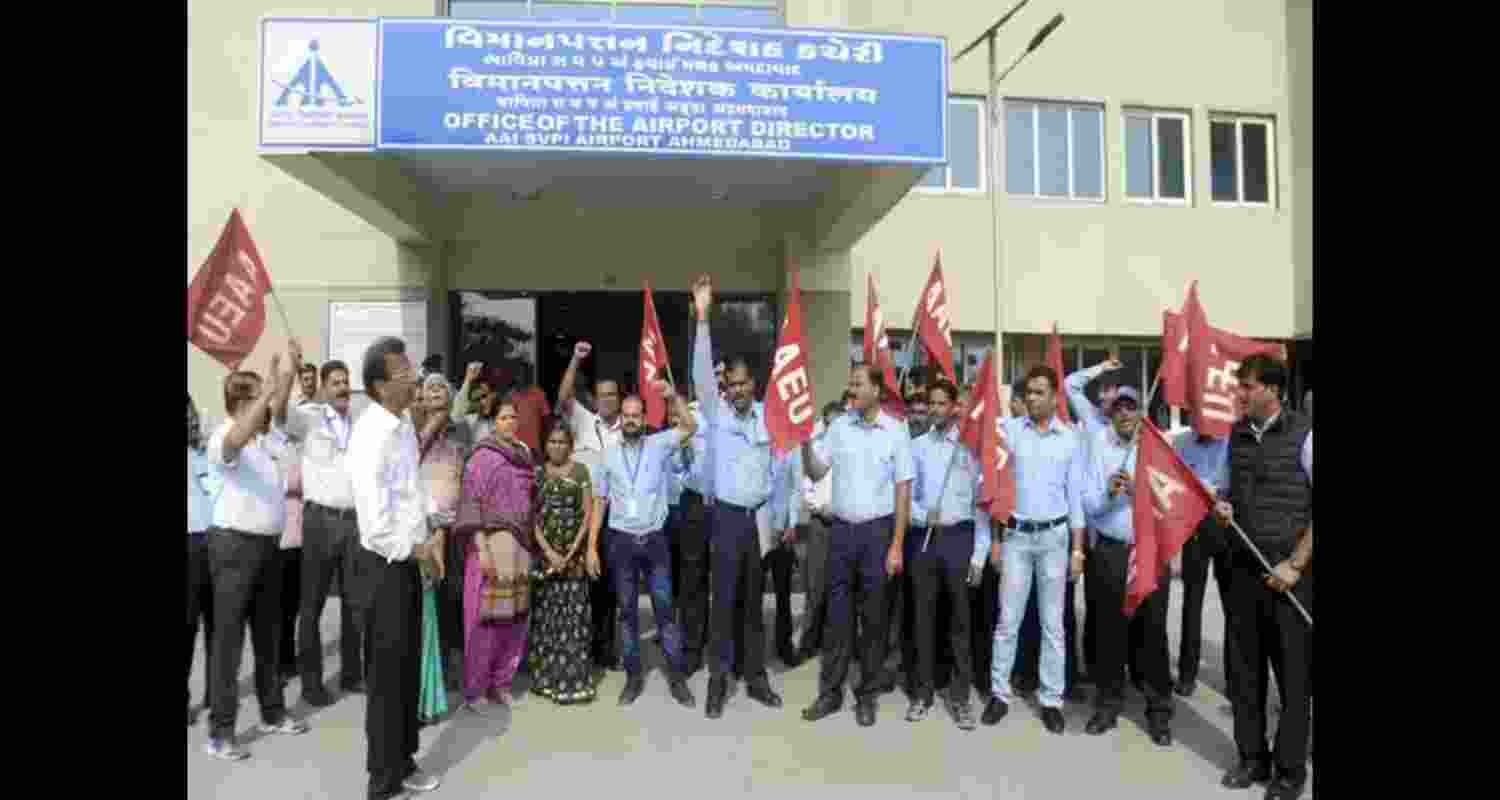 A file photo of Airports Authority Employees' Union protesting outside the airport director's office in Ahmedabad.