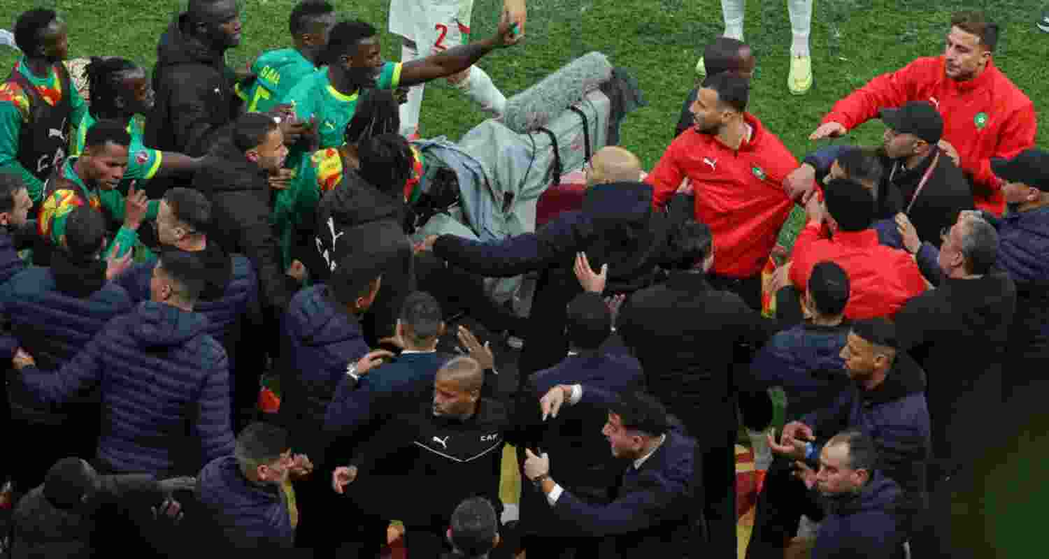 A file photograph of Senegal and Morocco players indulging in a heated argument as security officials try to intervene during the African Cup final.