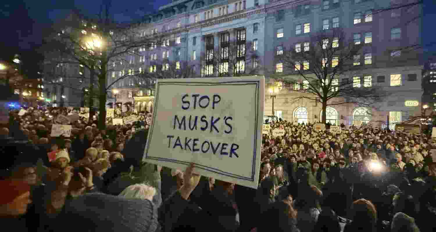 People protest outside the Treasury Department in Washington to stop Elon Musk's government takeover on February 5. Image: X