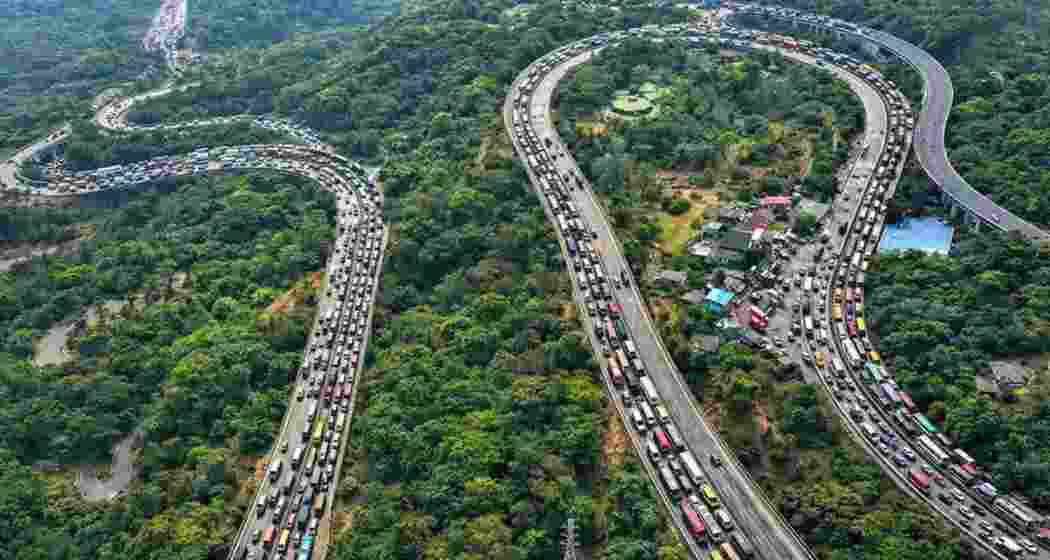 Vehicles stuck in a traffic jam on the Mumbai-Pune Expressway after a gas tanker overturned in the Khandala Ghat section in Raigad.
