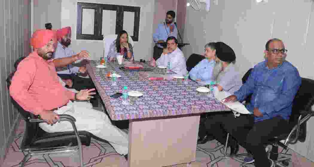 Members of Lambra Kangri Multipurpose Cooperative Service Society Ltd holding a meeting.