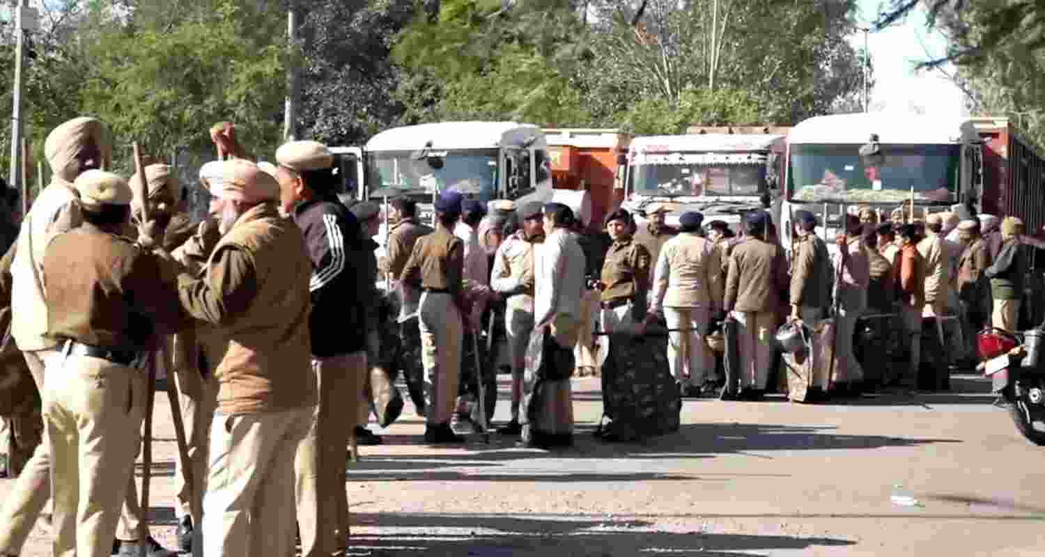 Security personnel keep vigil in view of farmers’ protest, in Chandigarh, on Wednesday.
