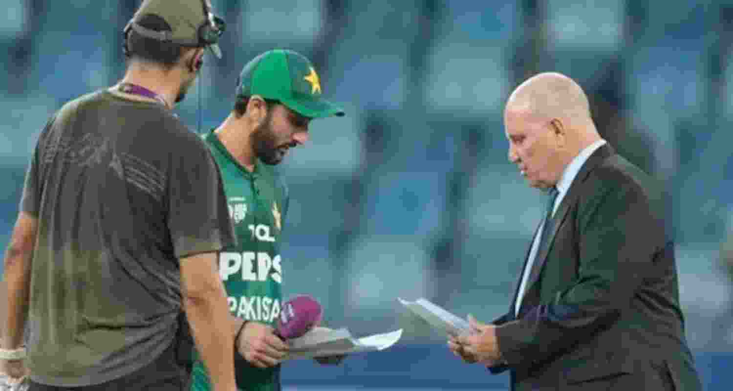A file photograph of match referee Andy Pycroft with the captains of India and Pakistan during their match last Sunday.