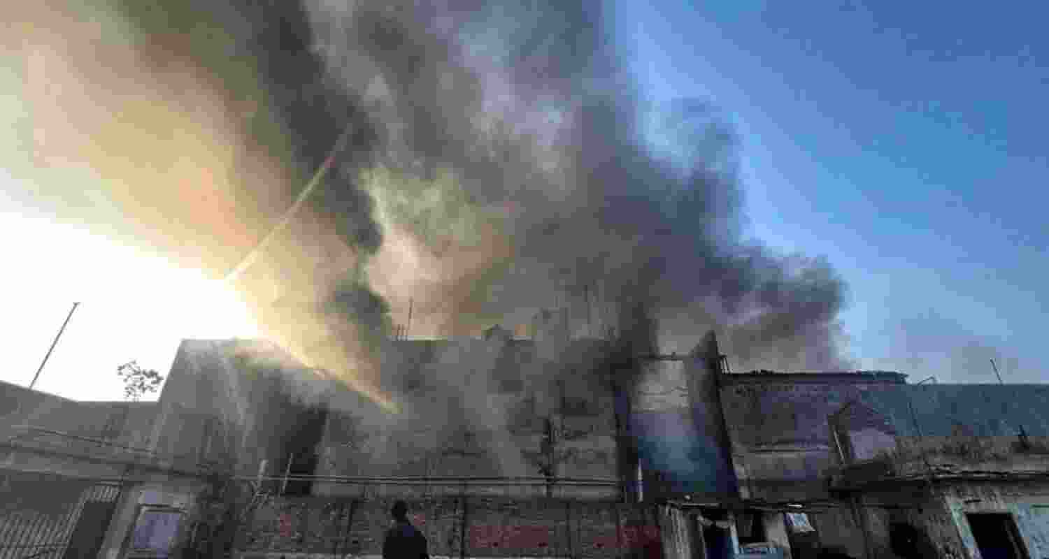 Smoke emanating from the second floor of a hoseiry unit which caught fire in Deep Nagar, Ludhiana, on Thursday.