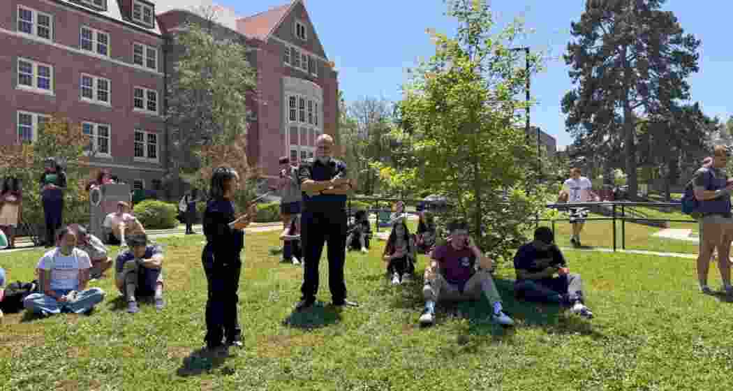 Florida State University students await updates during an active shooter situation near the student union in Tallahassee. Police responded swiftly as the university issued a lockdown and emergency alerts.