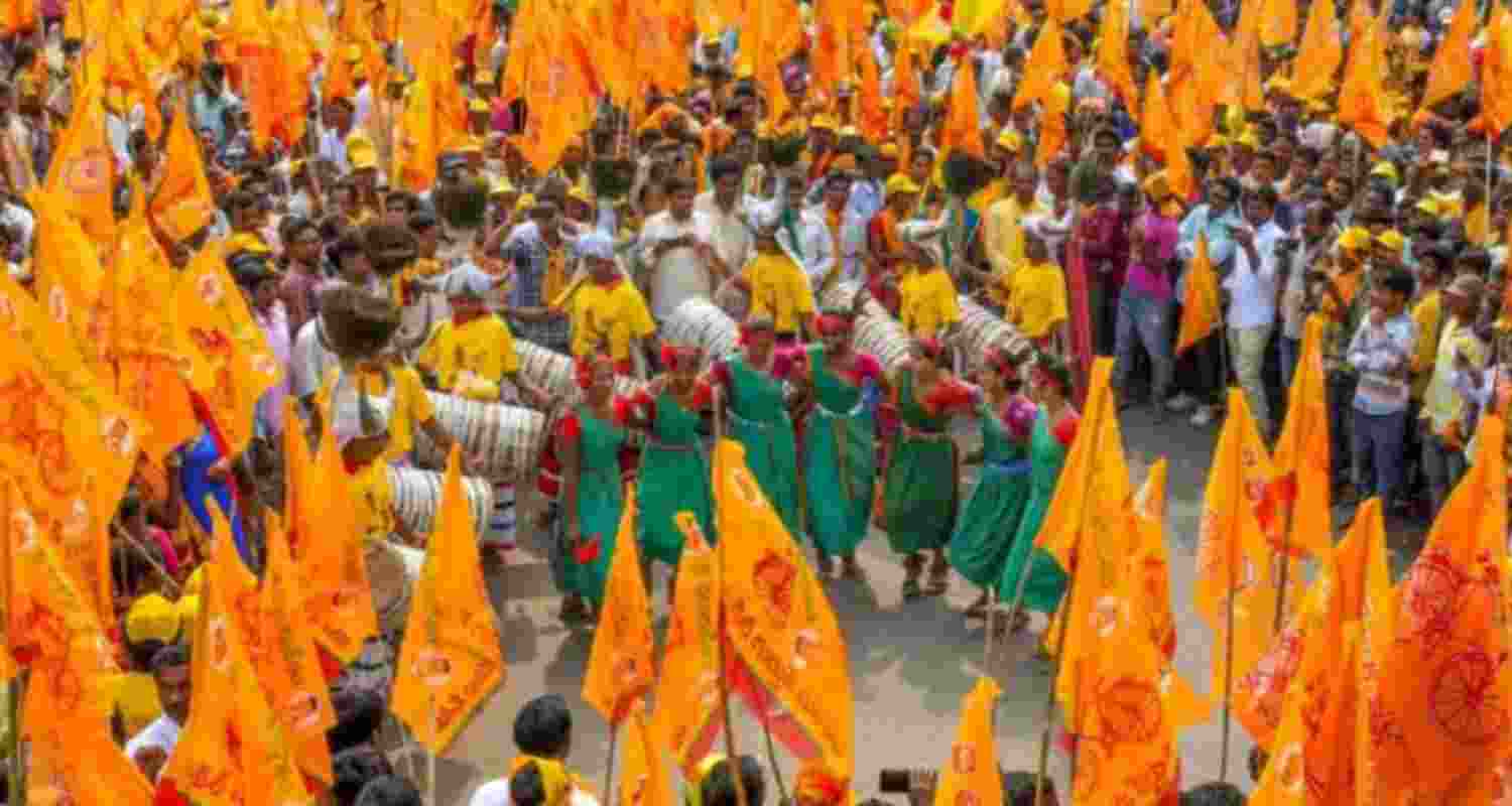 Folk artists perform at election campaign.