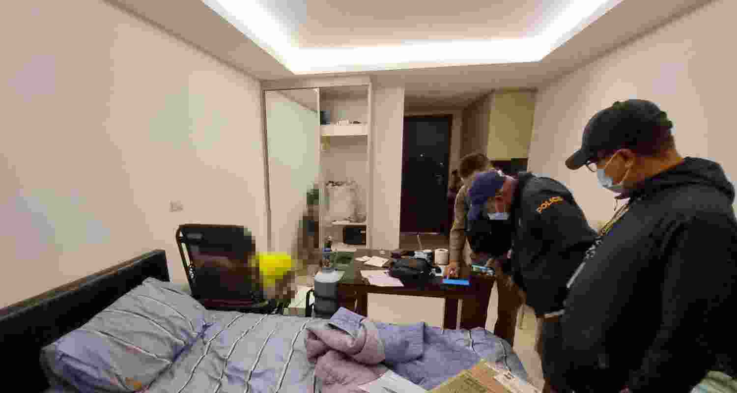 The Thailand police examining the room where an Indian tourist was found dead.