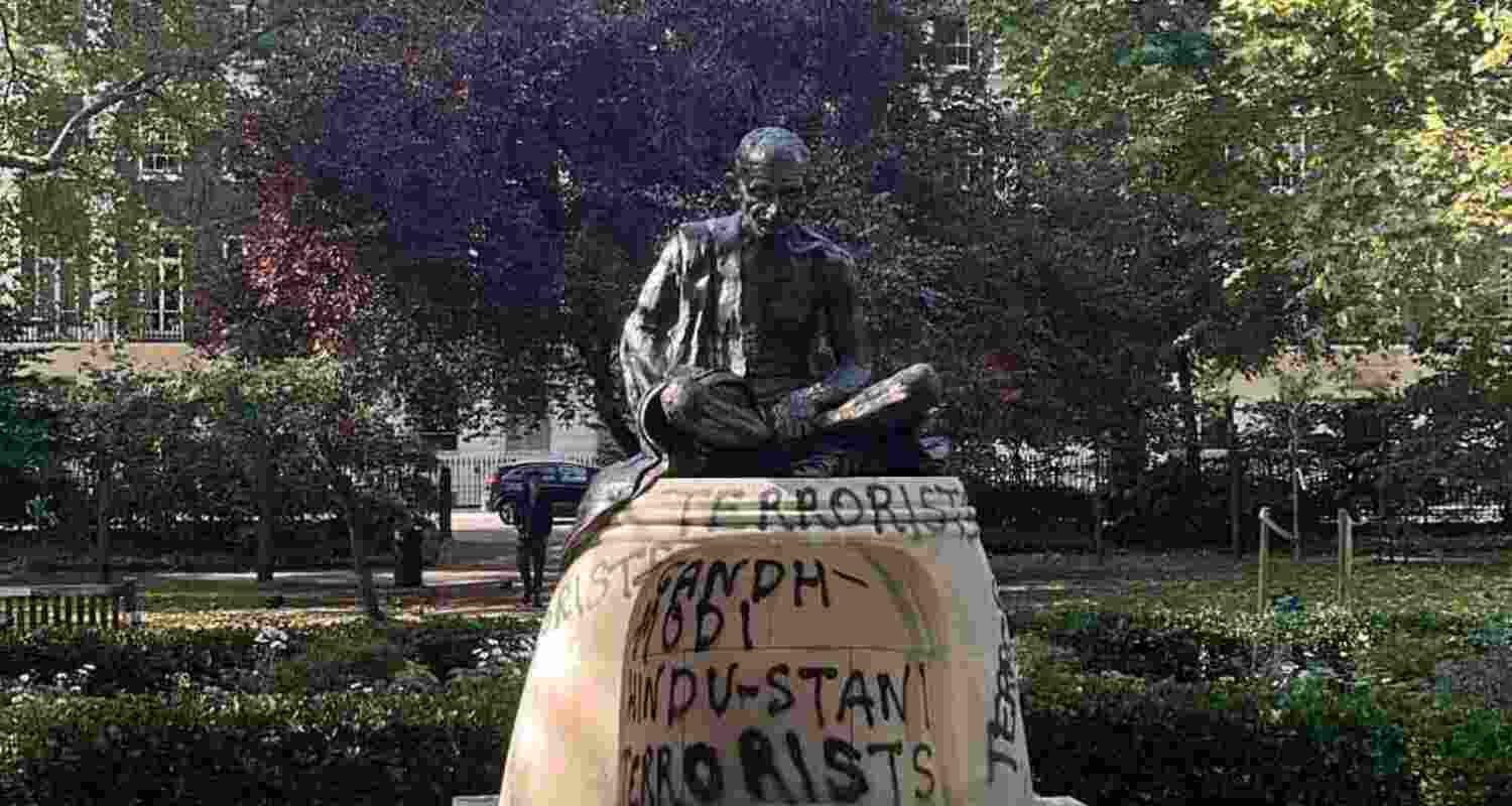 The plinth of the statue in London's Tavistock Square was defaced with some graffiti, as was seen in some pictures circulating on social media