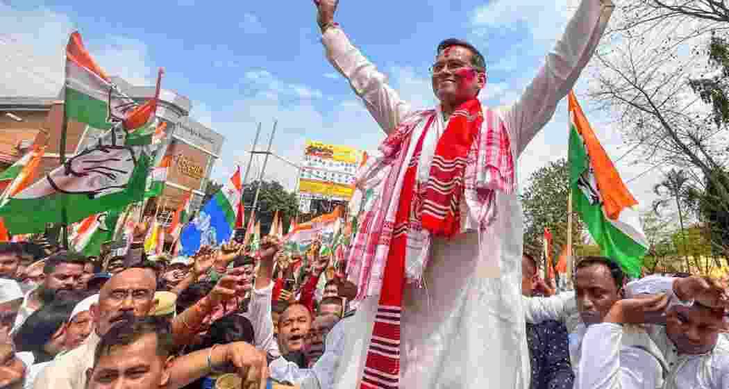 APCC president Gaurav Gogoi wave at supporter during the party's election camoaign in assam. (File photo)