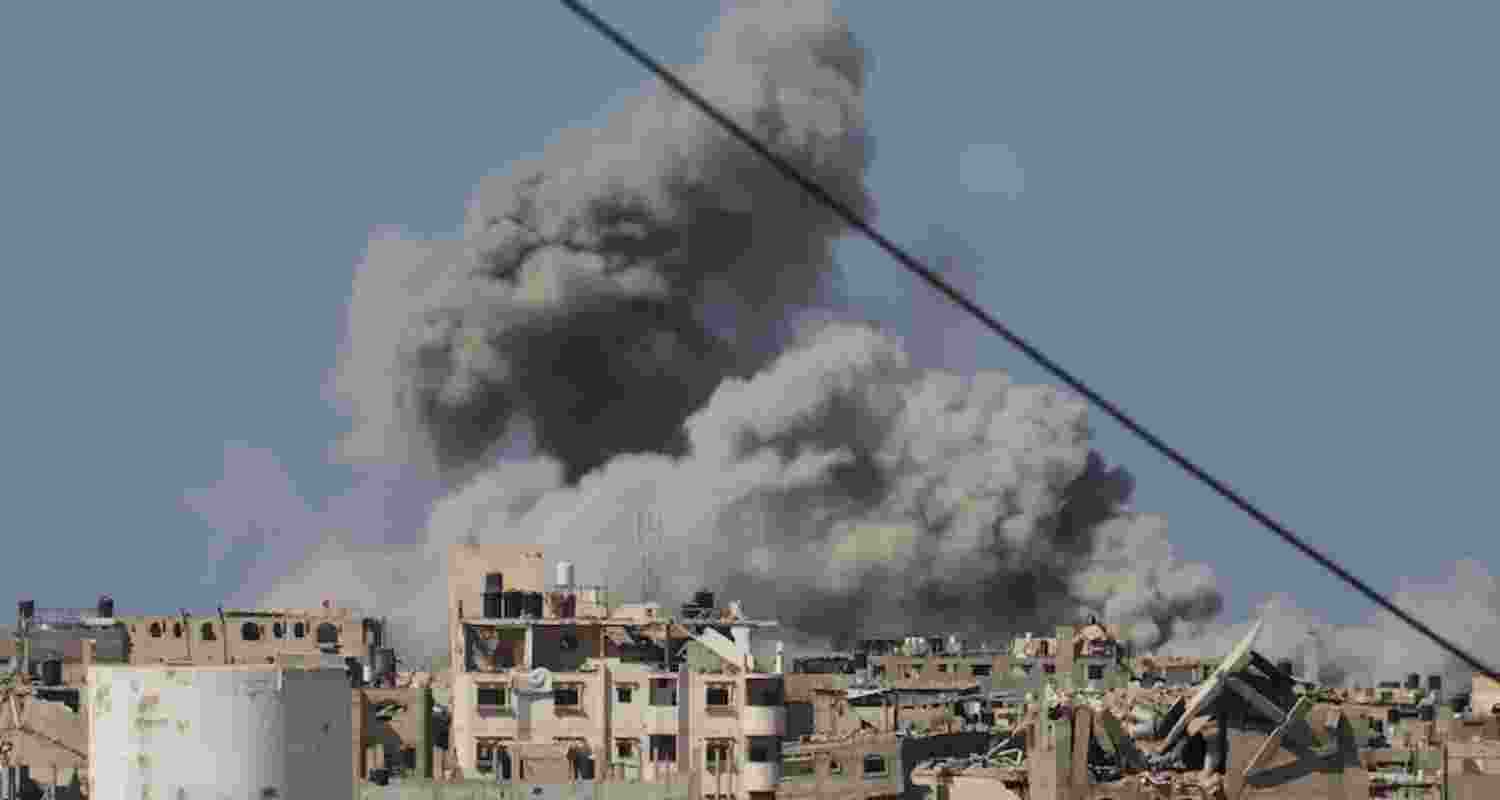 Smoke rises into the sky following an Israeli army air strike in Khan Younis in the Gaza Strip.