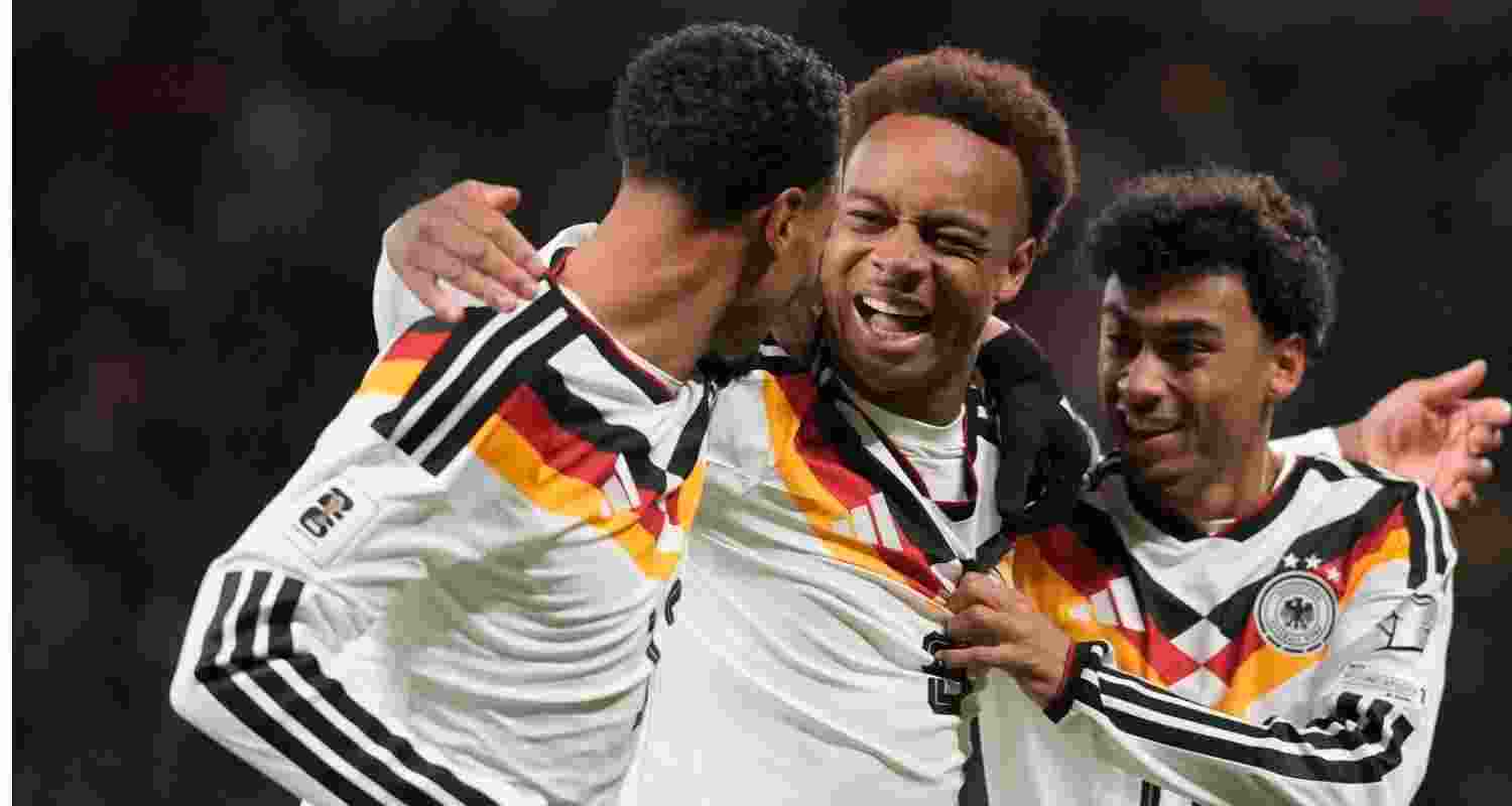 German players celebrating a goal in the qualifier against Slovakia.