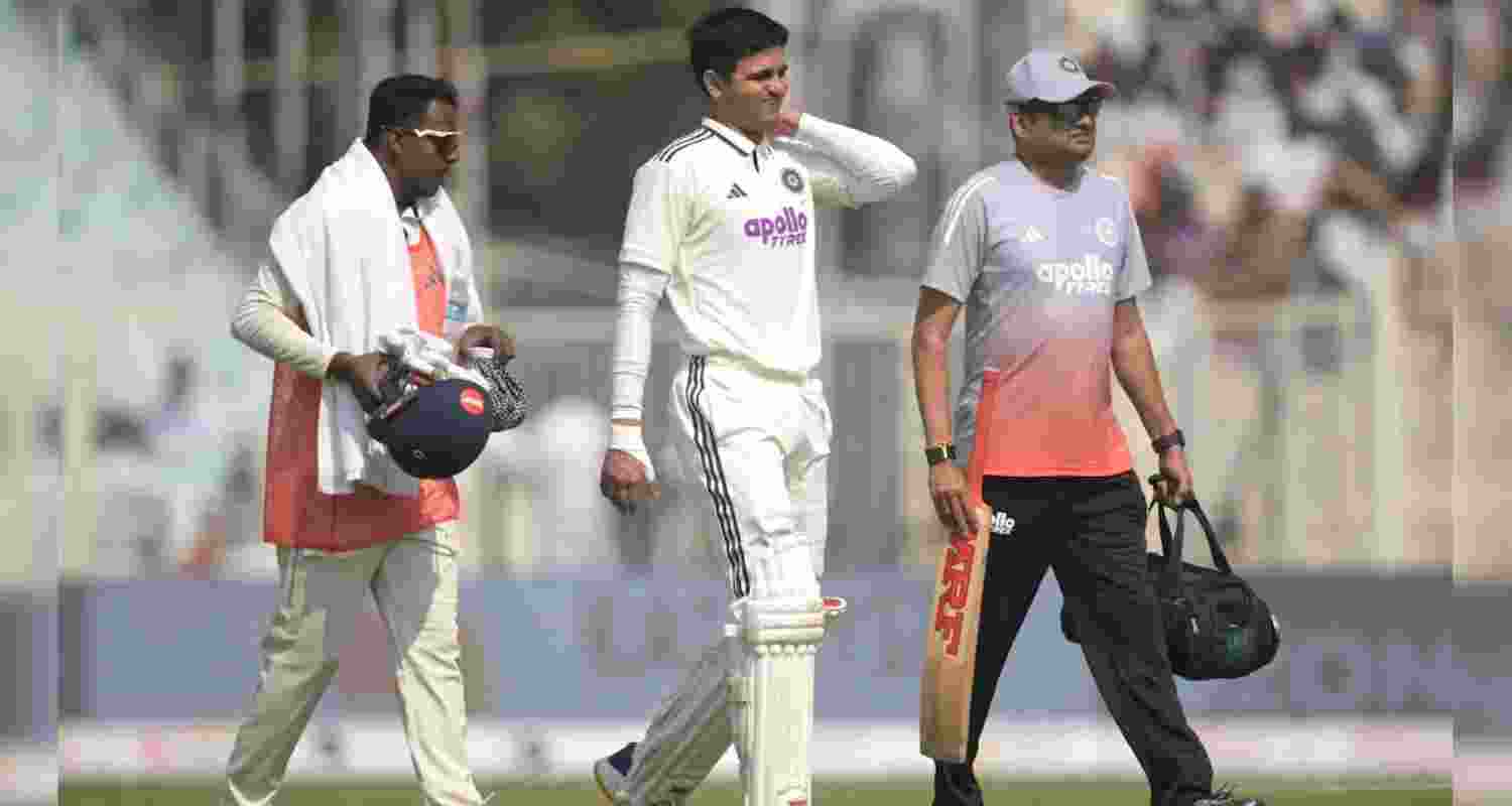 A file photograph of India's captain Shubman Gill walking off the field after suffering a neck injury in the first Test match against South Africa.