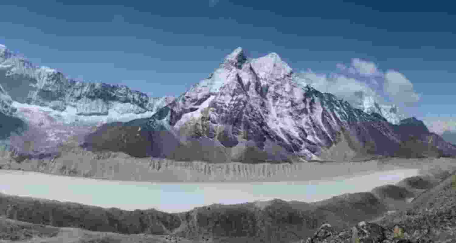 Imja Lake, a glacial lake in the Mount Everest region of Nepal, began as meltwater ponds in 1962 and now contains 90 million cubic meters of water. Its water level was lowered to protect downstream communities.