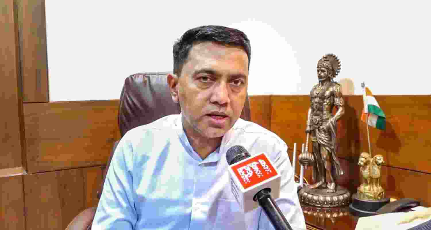 Goa Chief Minister Pramod Sawant speaks to media persons regarding the fire tragedy at a nightclub, in North Goa district, Sunday.